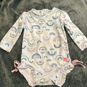 Rufflebutts Chase The Rainbow One Piece Rash Guard 6-12M